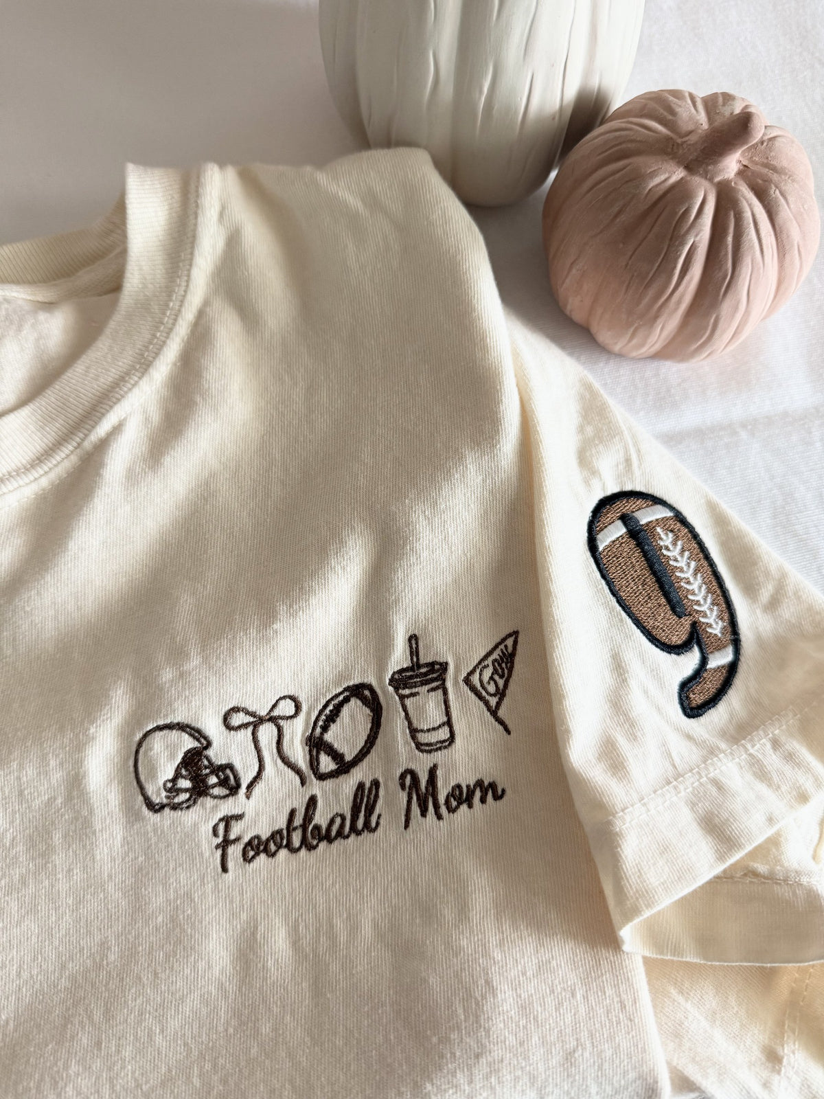 Sample: Football Mom chest design with the jersey number embroidered on the sleeve