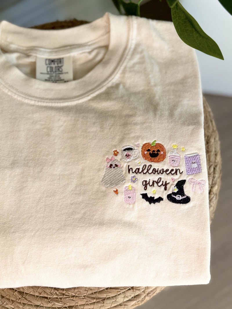 Sample: Halloween Girly design embroidered on the chest of an ivory tee